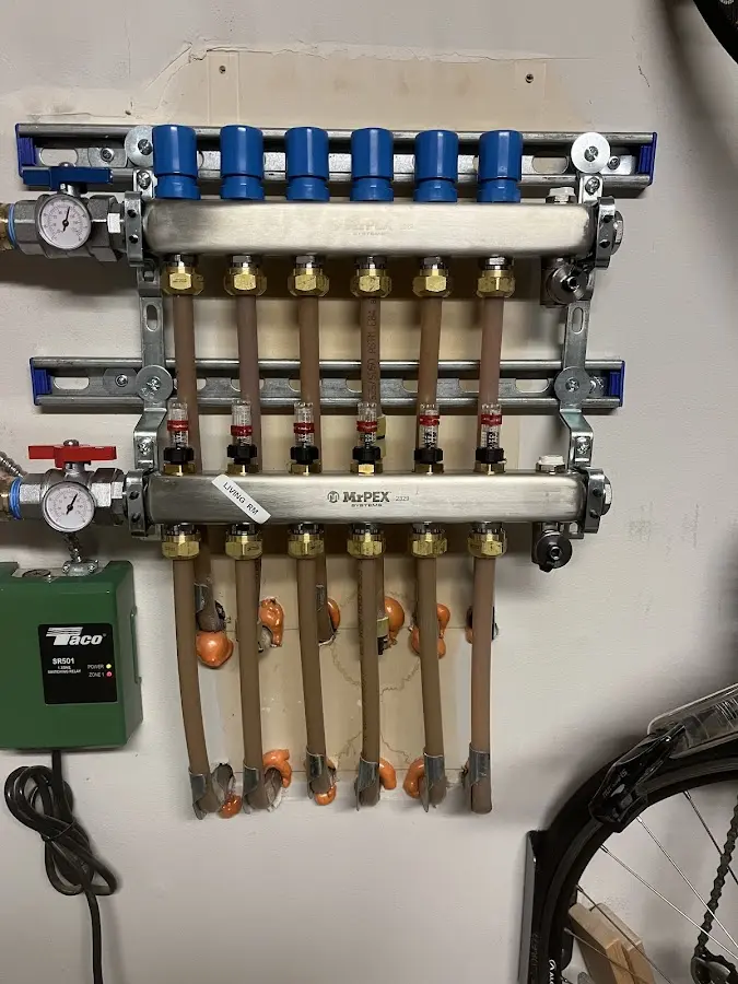 Plumber performing Leak Detection at a residential property in Naples Manor